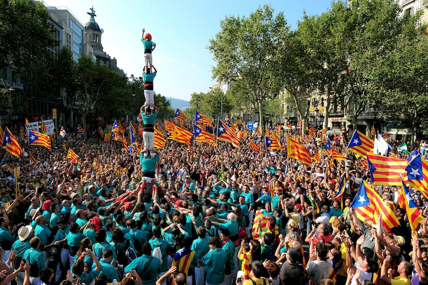 Supporters demonstrate in Barcelona in an unprecedented show of mass support for autonomy from Madrid.