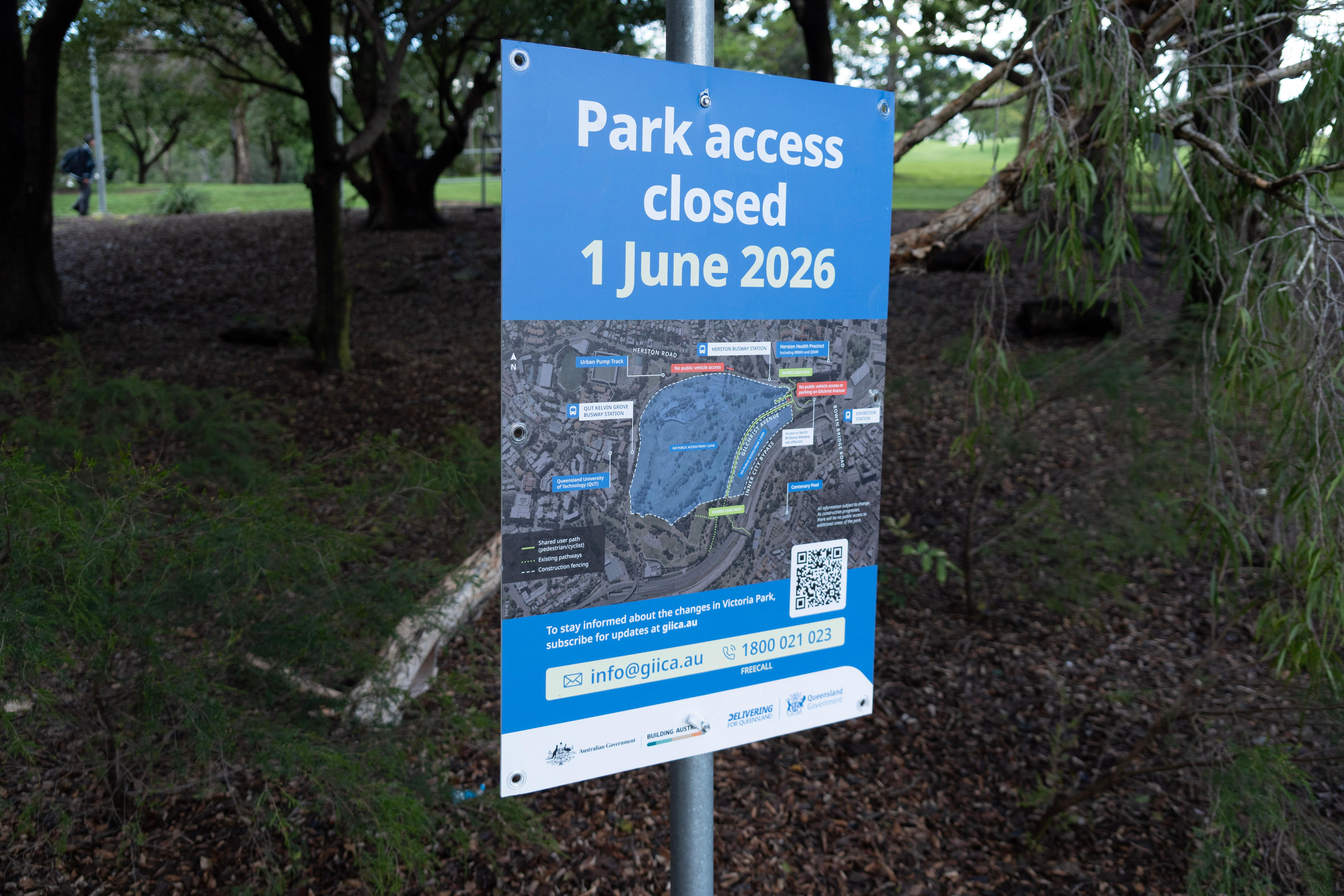 A sign reading "Park access closed 1 June 2026" in front of park.