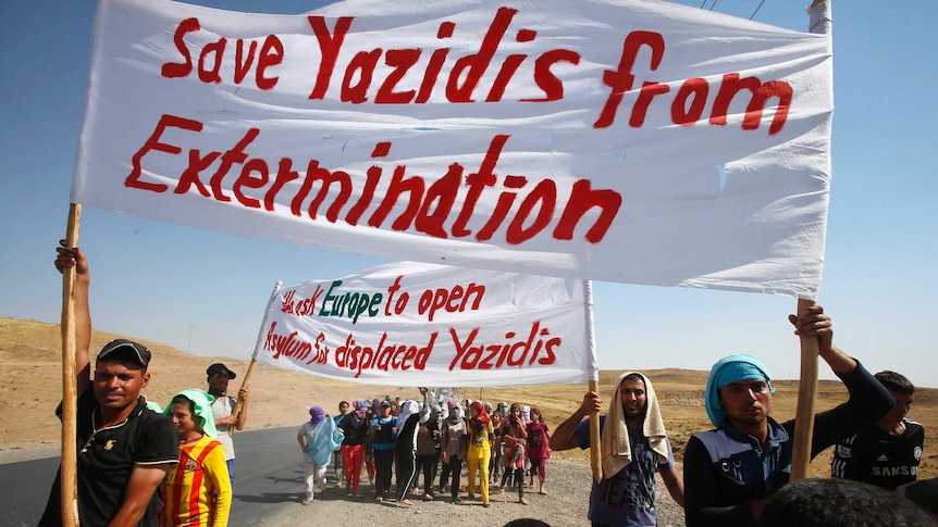 Yazidi refugees protest after fleeing Islamic State