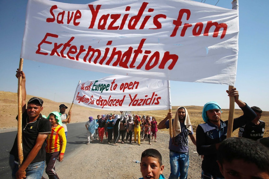 Yazidi refugees protest after fleeing Islamic State