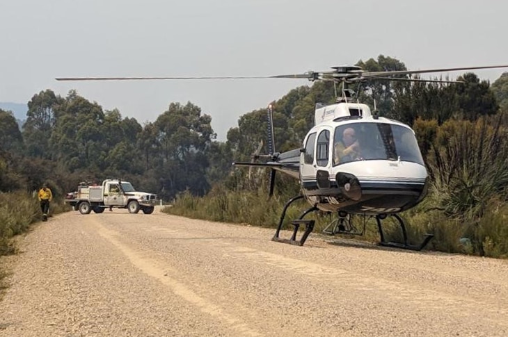 Helicopter sent to evacuate Tristan North and friends due to bushfire concerns.