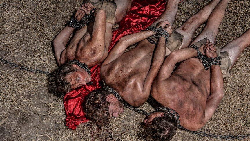 A group of men tied up