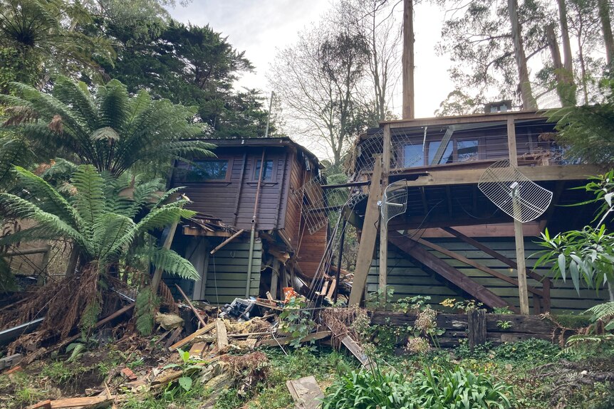 A gaping corridor of damage sits in the middle of a home nestled among Dandenong rainforrest.