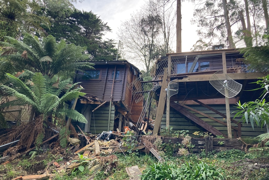 A gaping corridor of damage sits in the middle of a home nestled among Dandenong rainforrest.