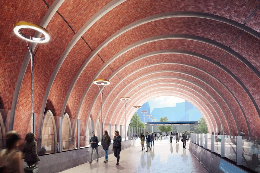 An artist impression of the concourse at the new North Melbourne Station, with brick archway over a pedestrian concourse.