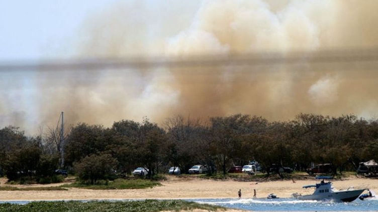 Thick smoke rises from the Gold Coast Spit