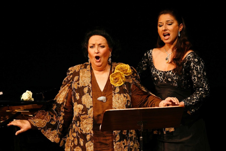 Opera singer Montserrat Caballe sings on stage with her daughter, Montserrat Marti