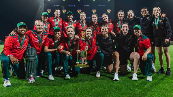 Tasmania celebrates winning the WNCL title.
