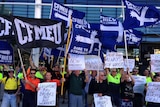CFMEU protests outside Leighton Holdings' Perth office claiming construction workers at the Perth Airport are being underpaid