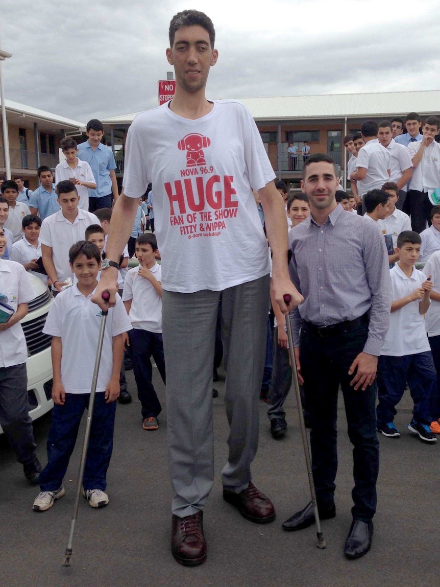 Tall man in Sydney school