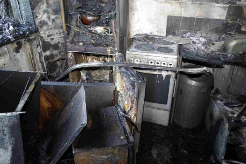 A completely destroyed kitchen after the fire.