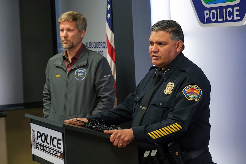 Albuquerque Mayor Tim Keller and police chief Harold Medina hold a press conference.