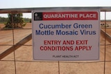 A sign indicating a Cucumber Green Mottle Mosaic Virus quarantine zone.