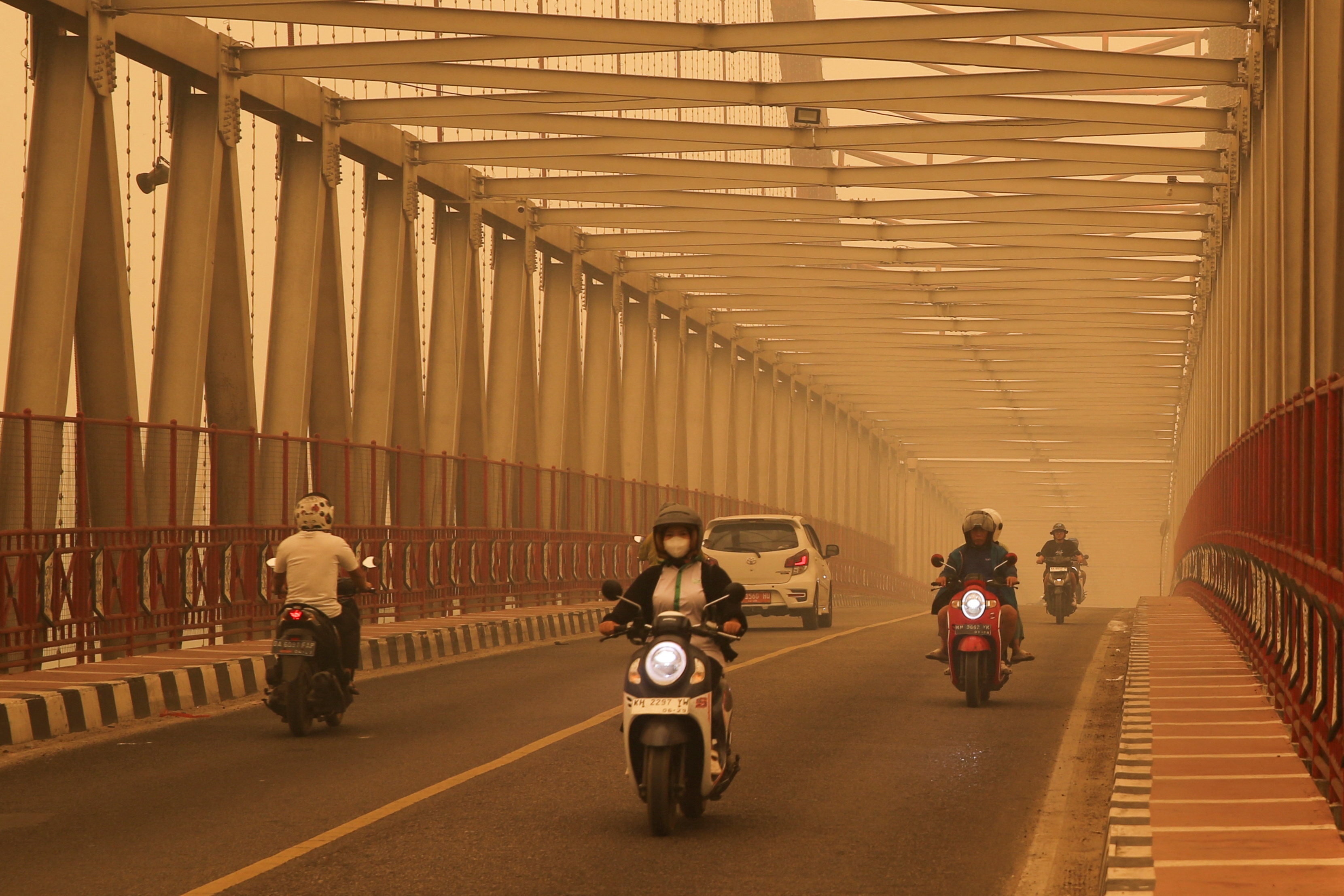 Millions across Asia suffer through heatwaves and fire smoke at the ...