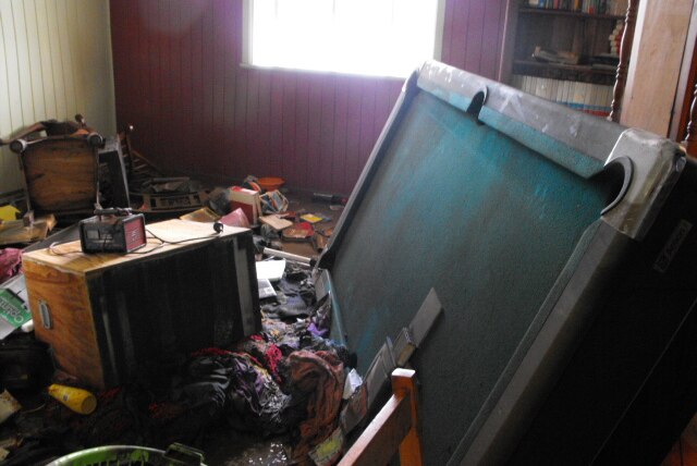 A pool room destroyed by floodwaters in Moores Park.