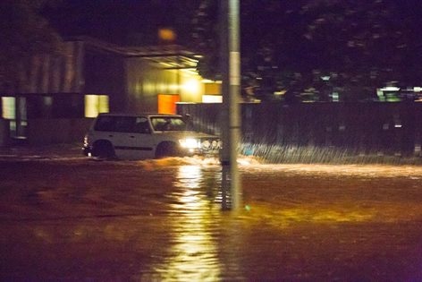 Traffic struggled with flooded roads in Kununurra on Tuesday night.