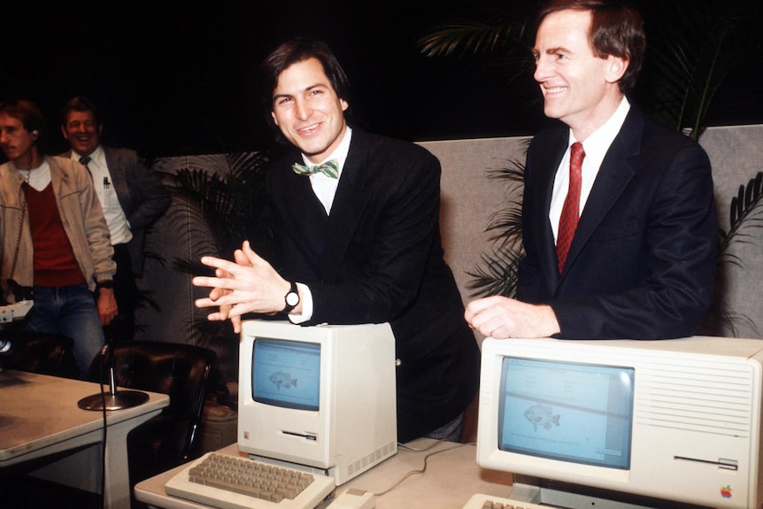 Steve Jobs, centre, unveils new Macintosh in 1984