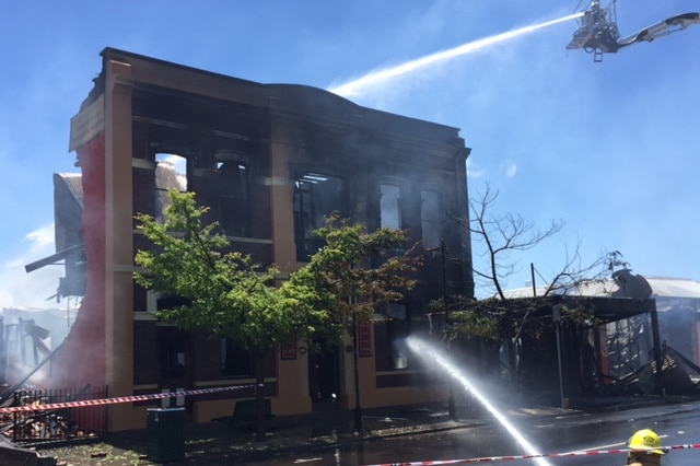 The burnt out facade of Reliquaire European doll shop