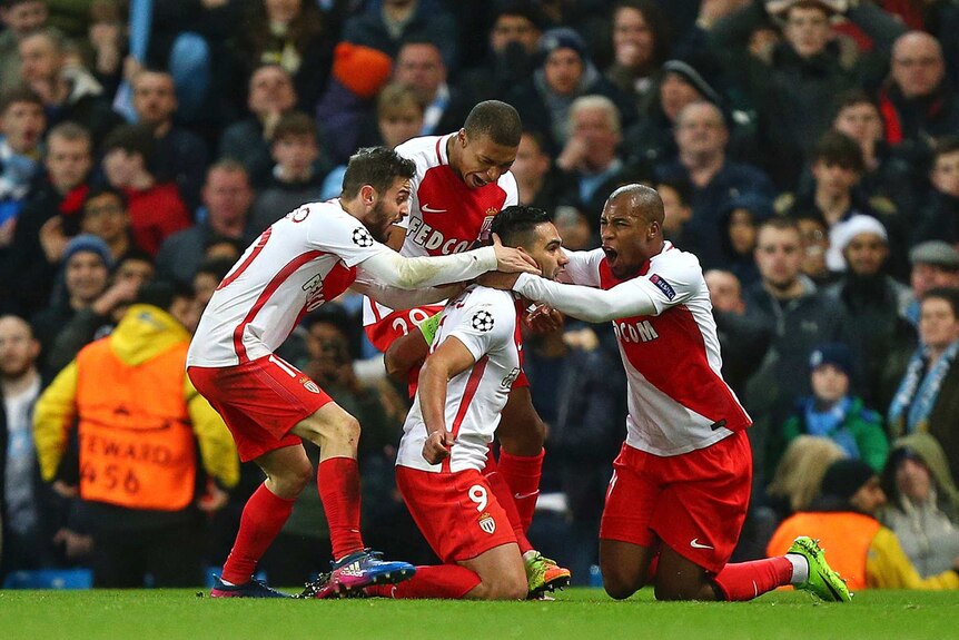 Radamel Falcao celebrates Monaco's third goal against Manchester City in the Champions League