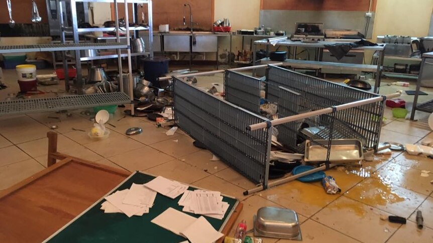 Shelves and other equipment lies on the floor of the Pacific Casino Hotel kitchen.