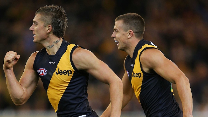 Richmond's Brett Deledio (R) celebrates with Dustin Martin during the round one, 2013 match with Carlton.