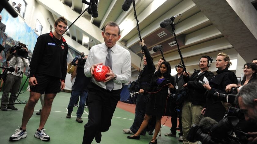Tony Abbott has a kick-to-kick