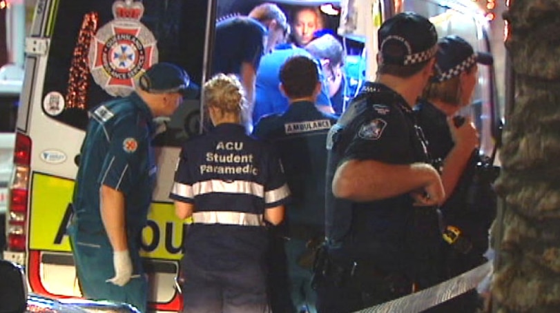 Queensland Ambulance staff on the scene of a one-punch attack on the Gold Coast.