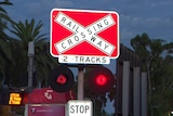 Railway level crossing lights and bells