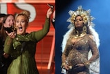 Adele holds up her broken Grammy (R) while Beyonce performs during the awards ceremony (L)