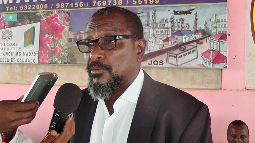 One of Somalia's most notorious pirate leaders, Mohamed Abdi Hassan, known as "Afweyne" or "Big Mouth", speaks with journalists.