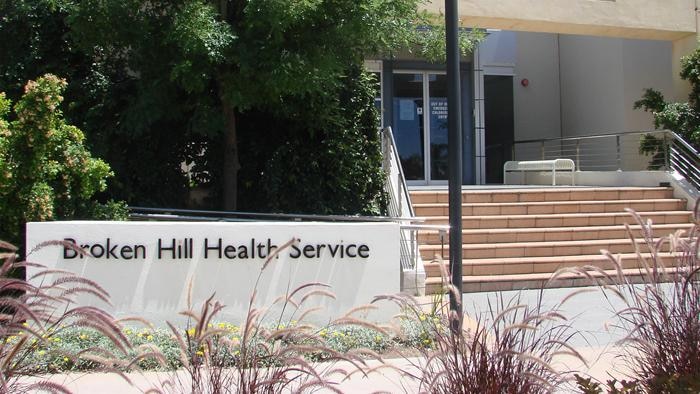 A sign on a building reads Broken Hill Health Service.