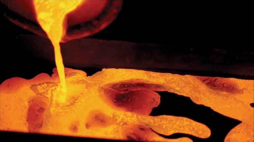 Molten gold being poured