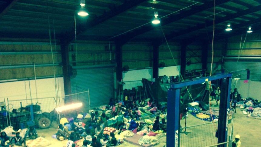 A workshop shelter on Elcho Island houses people sheltering from Cyclone Lam.