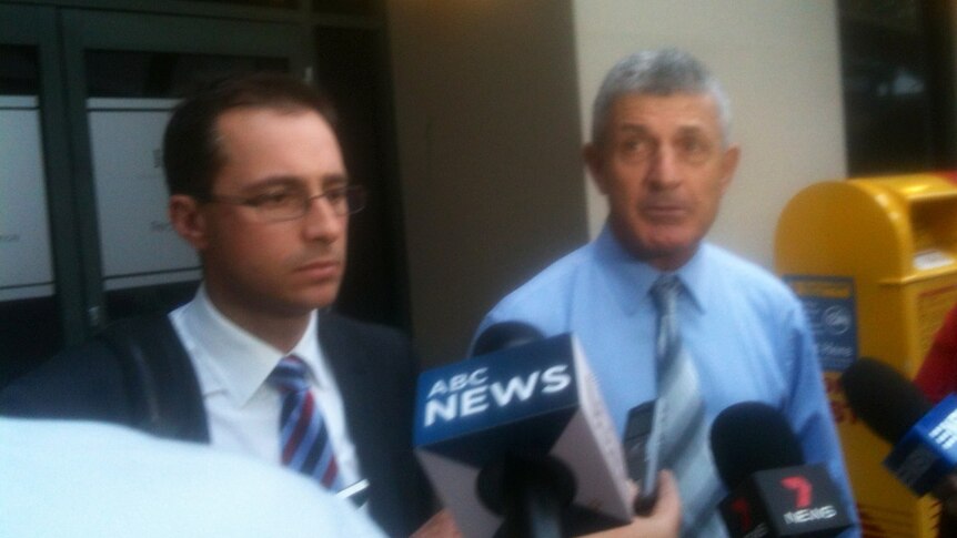 HSG CEO Troy Palmer and Knights Members Club chairman Nick Dan address the media after the meeting. December 17, 2012.