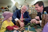 Malcolm Turnbull and Simon Birmingham at a childcare centre.