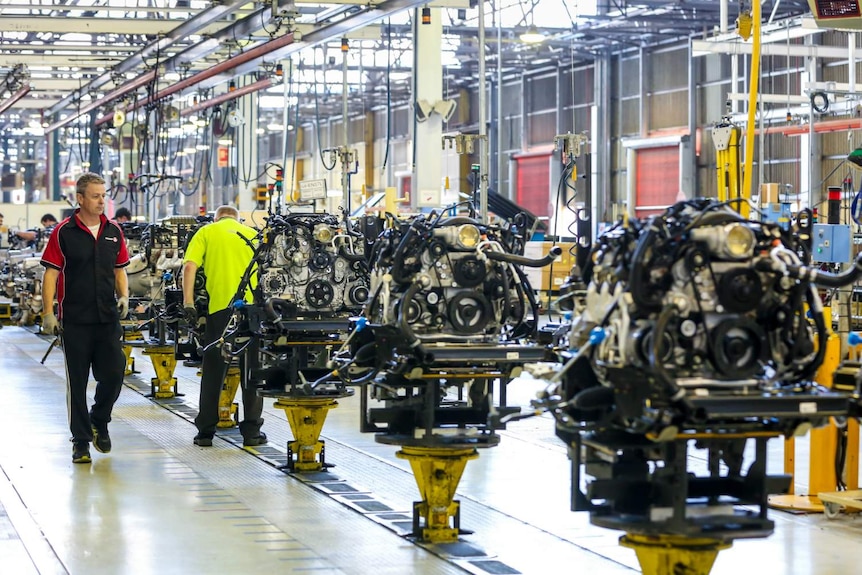 A Holden worker walks down the assembly line at the Adelaide plant.
