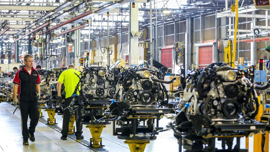 A Holden worker walks down the assembly line at the Adelaide plant.