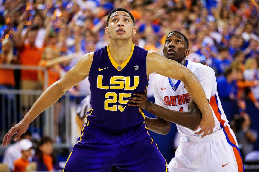 Ben Simmons watches the ball