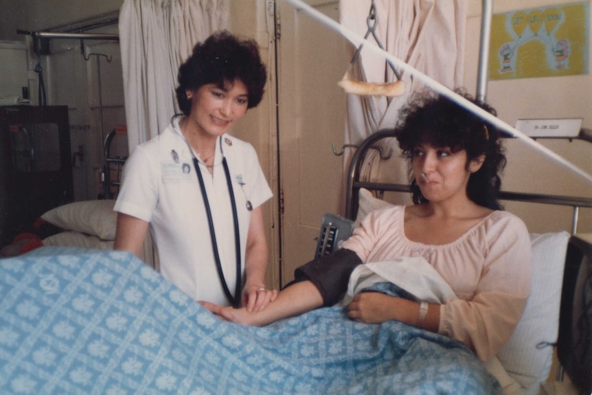 A young nurse with a patient