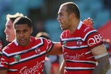 Attacking prowess ... Blake Ferguson (R) celebrates his try with team-mate Michael Jennings