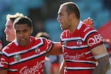 Attacking prowess ... Blake Ferguson (R) celebrates his try with team-mate Michael Jennings