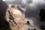 Floodwater pouring over the Barron Falls in north Queensland.