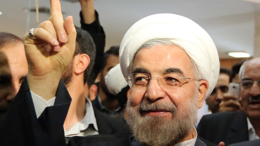 Hassan Rowhani votes in Iran poll