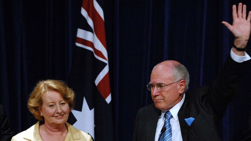 Outgoing Prime Minister John Howard waves farewell