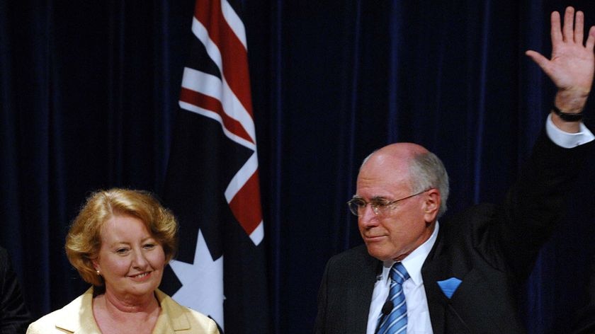 Outgoing Prime Minister John Howard waves farewell