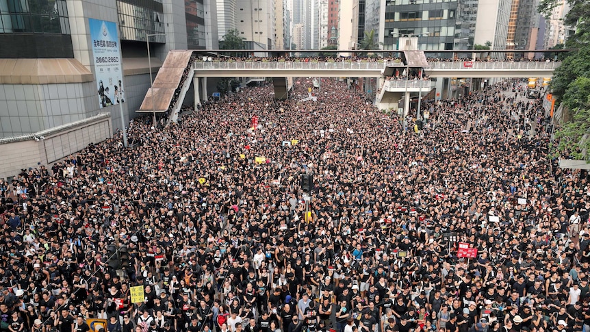 Protesters attend a demonstration demanding Hong Kong's leaders to step down.