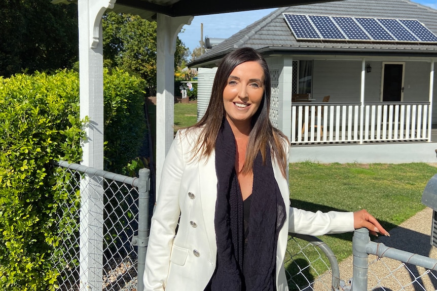 Sarah Bailey outside a home.