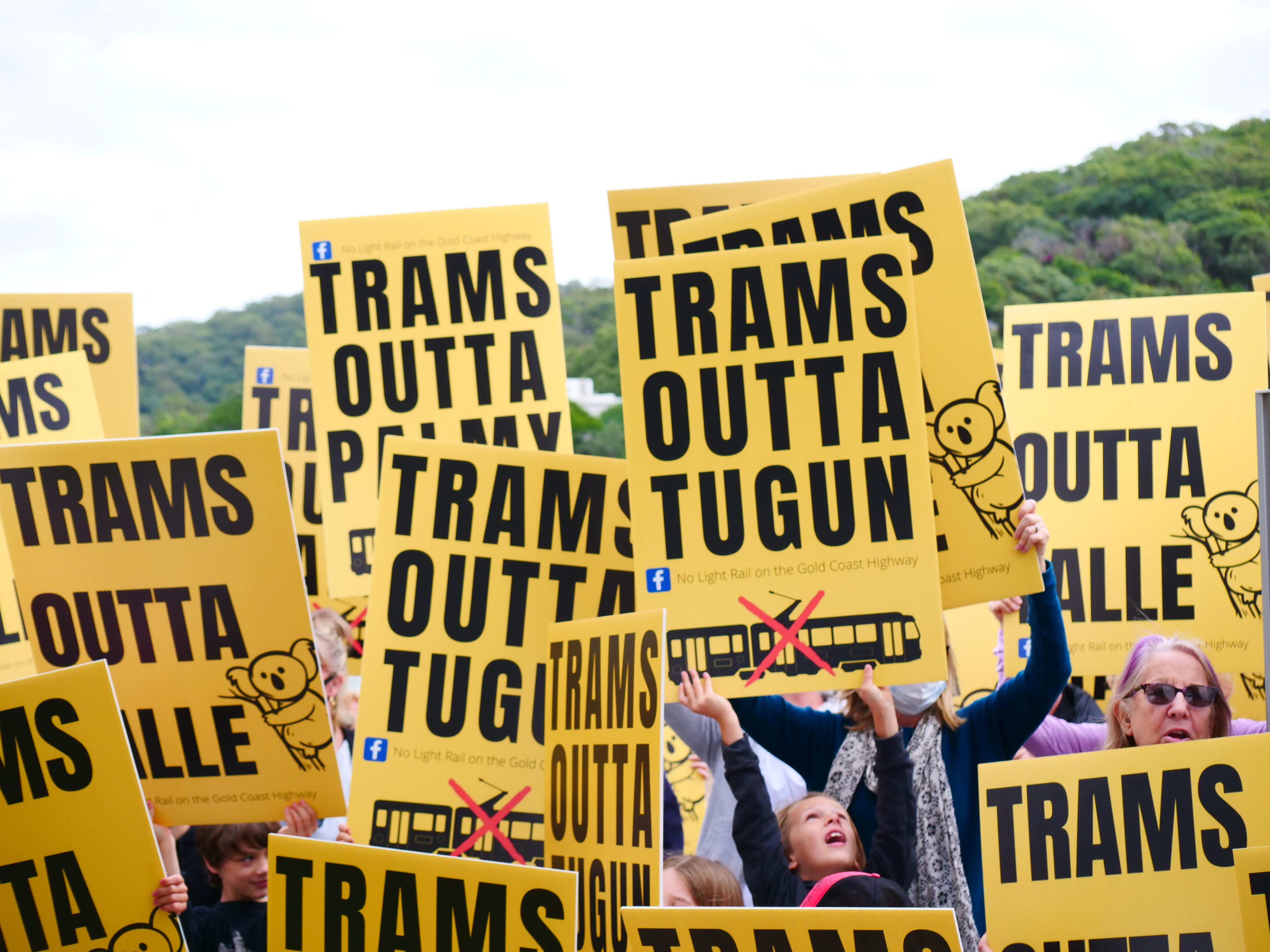 signs saying trams outta tugun