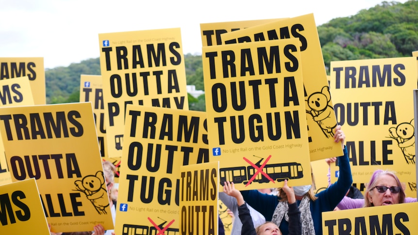 signs saying trams outta tugun