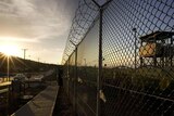 The sun rises over the Guantanamo Bay military prison.